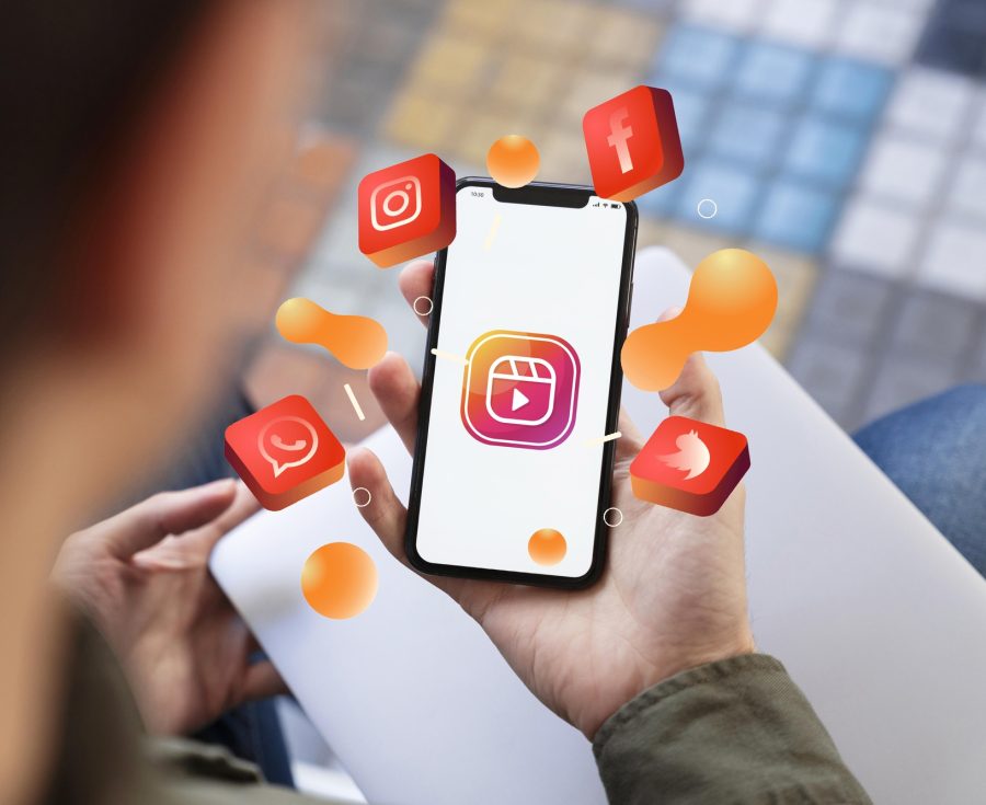 hand-holding-smartphone-social-media-concept